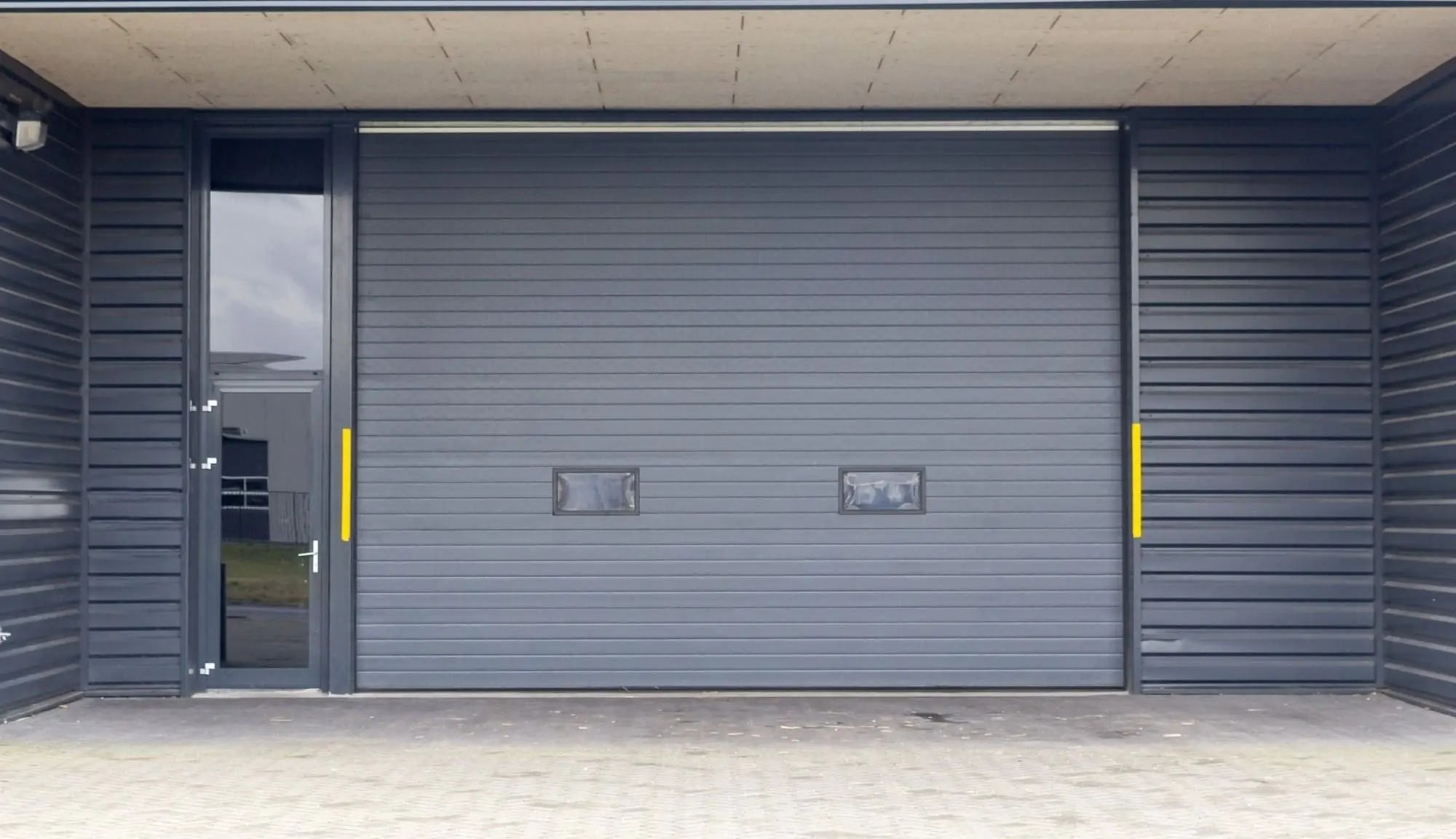 Réparation porte garage sectionnelle