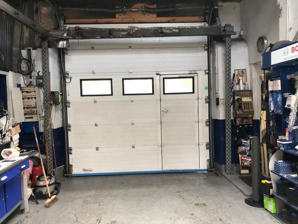 reparation porte garage sectionnelle  Bourg la Reine
