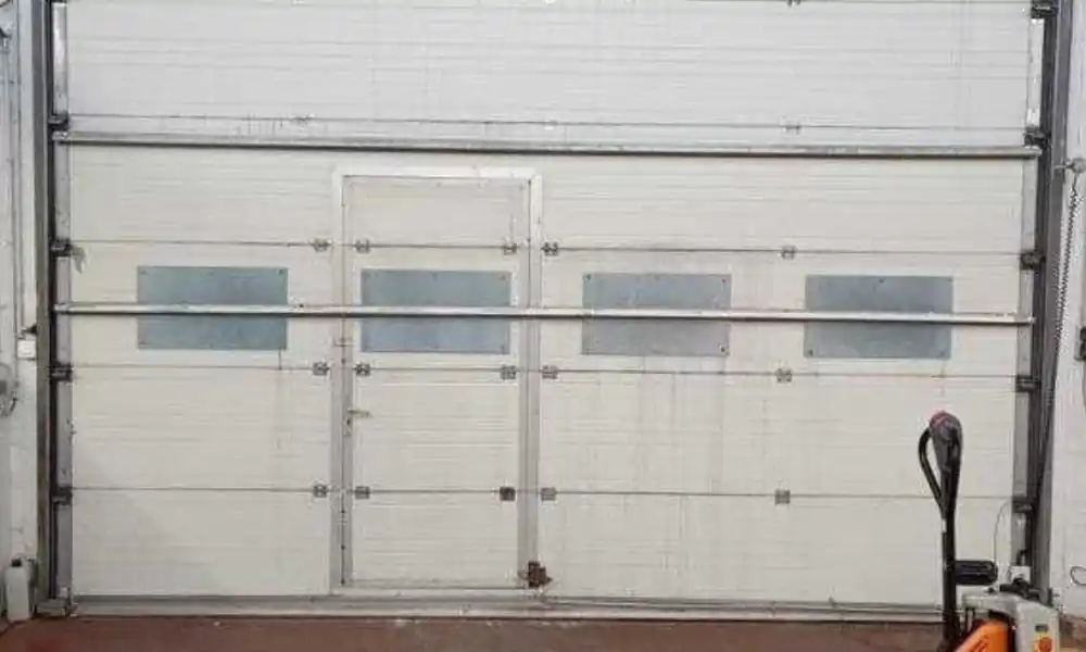 dépannage porte sectionnelle 95500