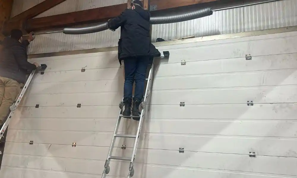 réparation porte sectionnelle Deuil la Barre
