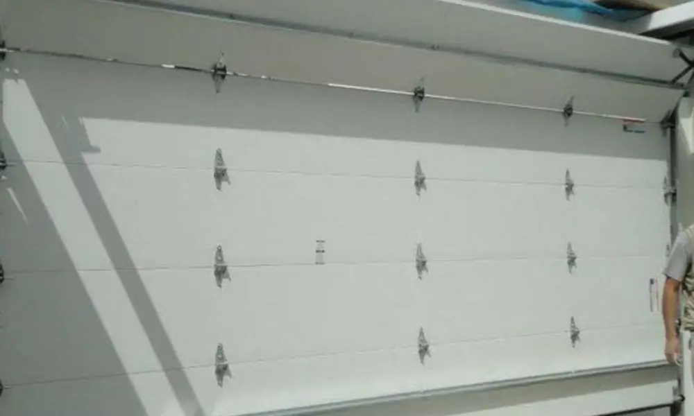 réparation porte sectionnelle Bondoufle