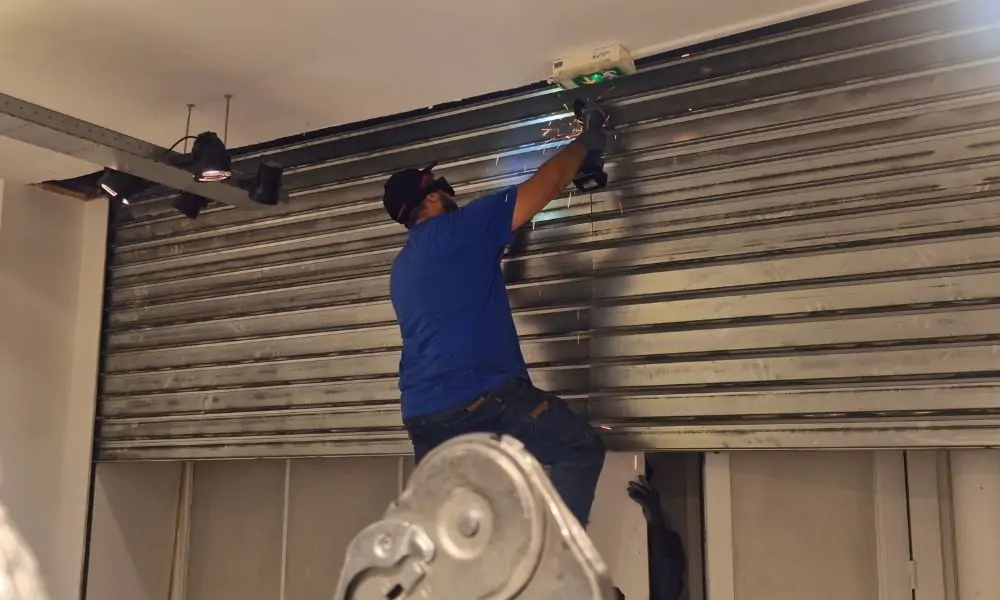 Remplacement lames rideau métallique paris