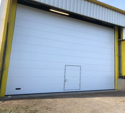 Réparation porte sectionnelle industrielle