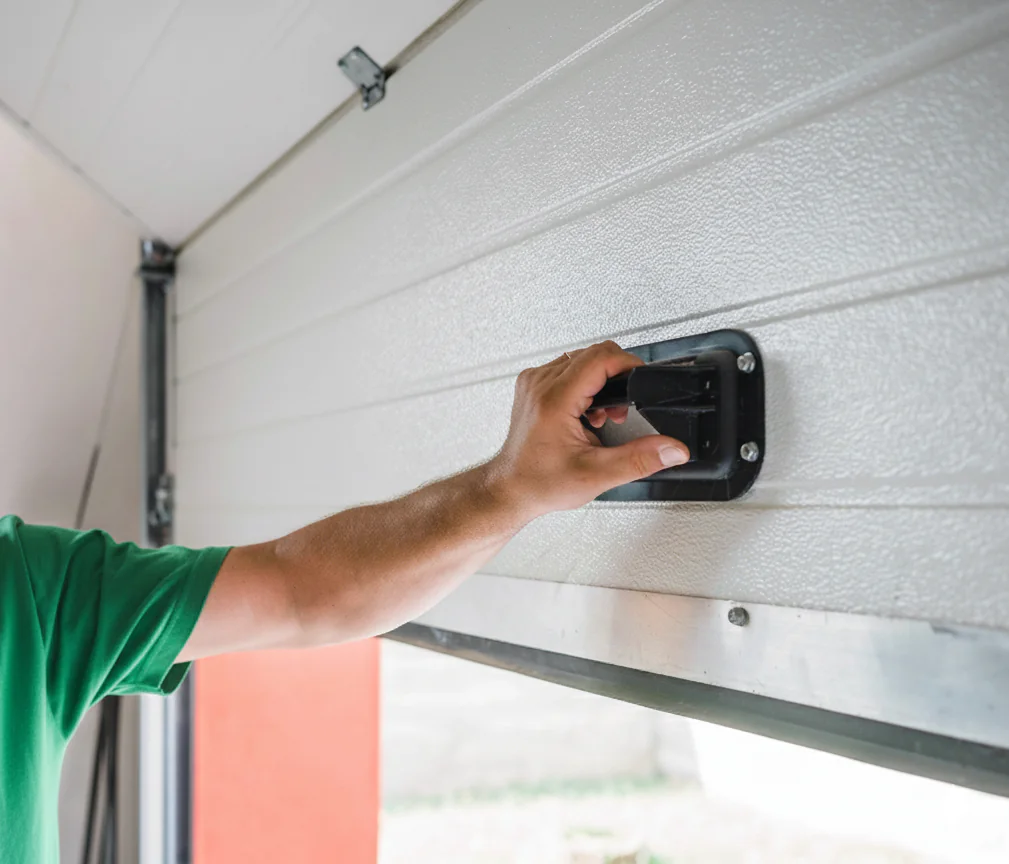 Comment ouvrir une porte de garage bloquée